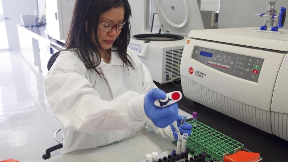 Aubrey Zapanta works in March at the lab at Guardant Health, which performed a study of liquid biopsies in Redwood City, Calif. The blood test to detect cancer mutations produced results that match those of a regular tissue biopsy, researchers reported, heralding a time when diagnosing cancer may become less painful and risky.