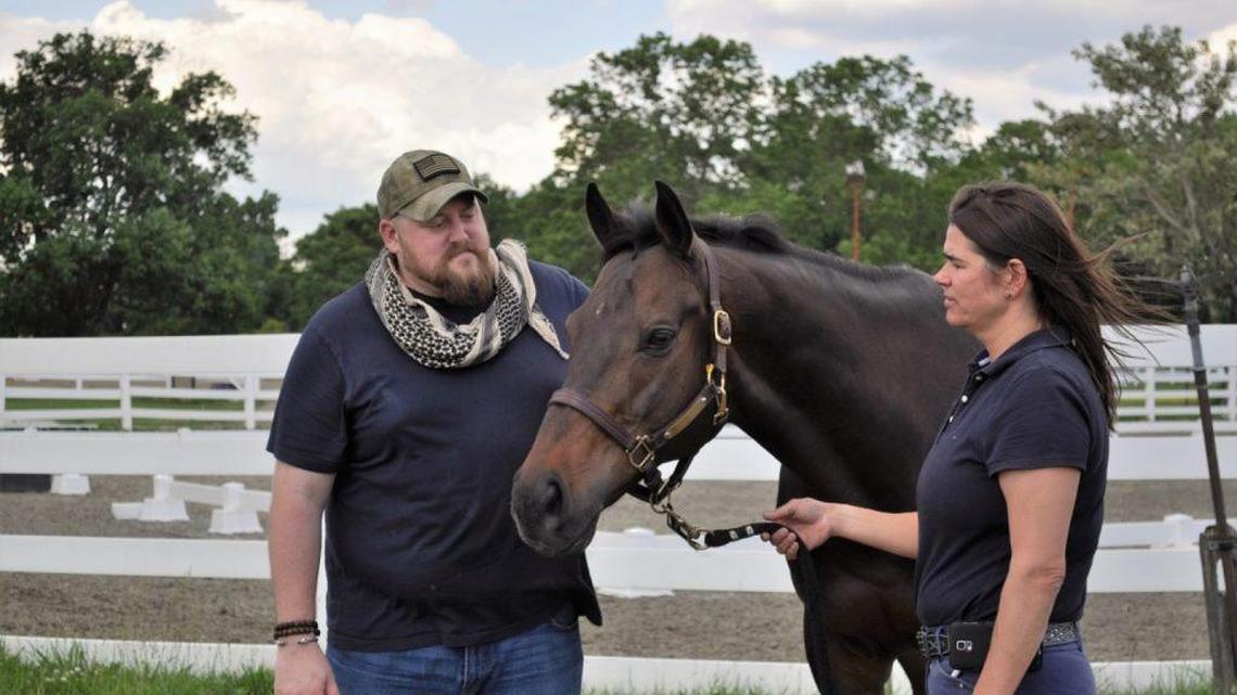 U.S. Marine Sergeant Matthew Ryba believes equine therapy could help troubled veterans.