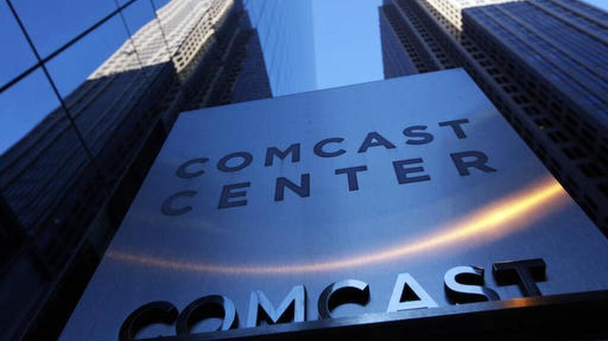 A sign outside the Comcast Center is seen in Philadelphia.