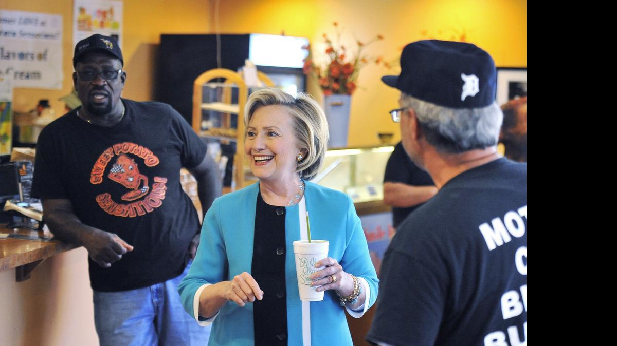 
Democratic presidential candidate Hillary Rodham Clinton mades a stop at the popular Sweet Potato Sensations bake shop in Detroit on July 21, 2015. 
