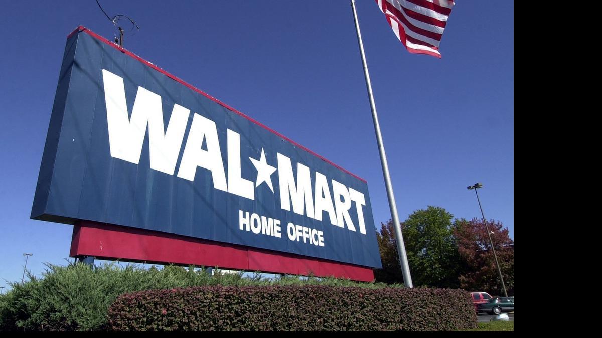 
A Wal-Mart sign stands in front of the Wal-Mart Stores Inc. headquarters in Bentonville, Ark. Wal-Mart announced it will no longer sell merchandise that has the Confederate flag on it.
