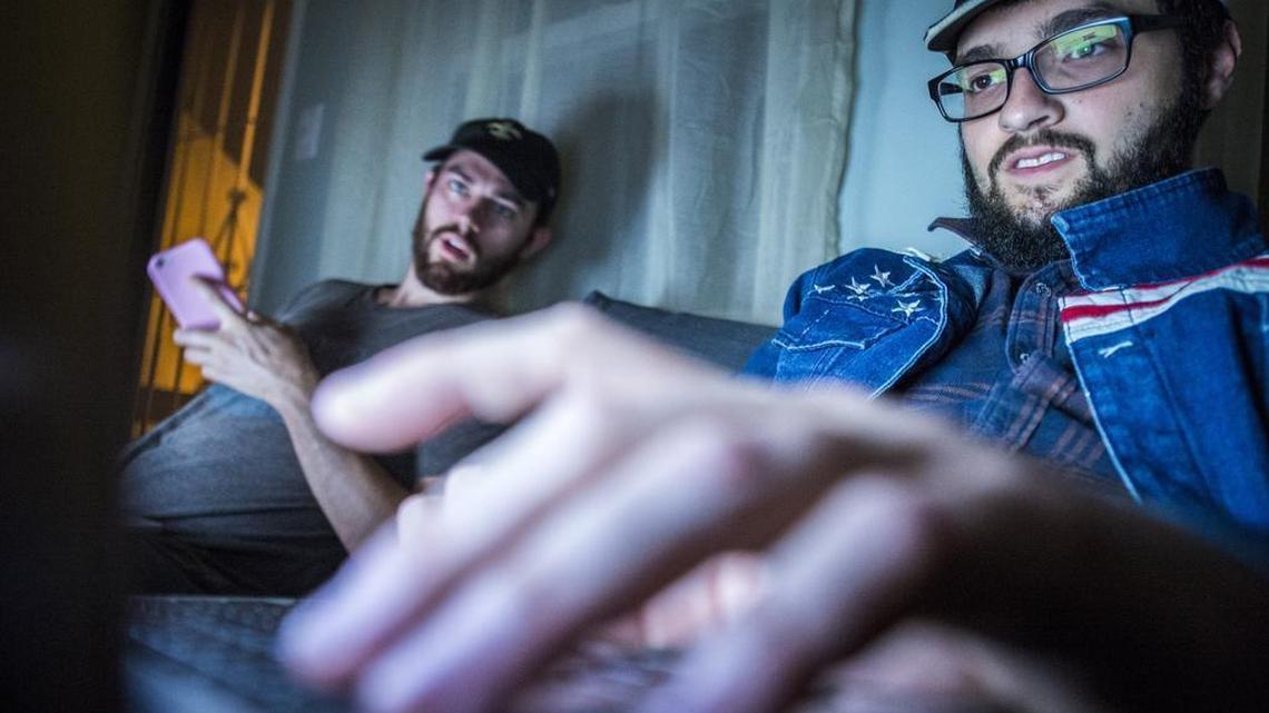 Liberty Writers News founders Paris Wade, left, and Ben Goldman work at their apartment in Long Beach, Calif., on Nov. 14, 2016.