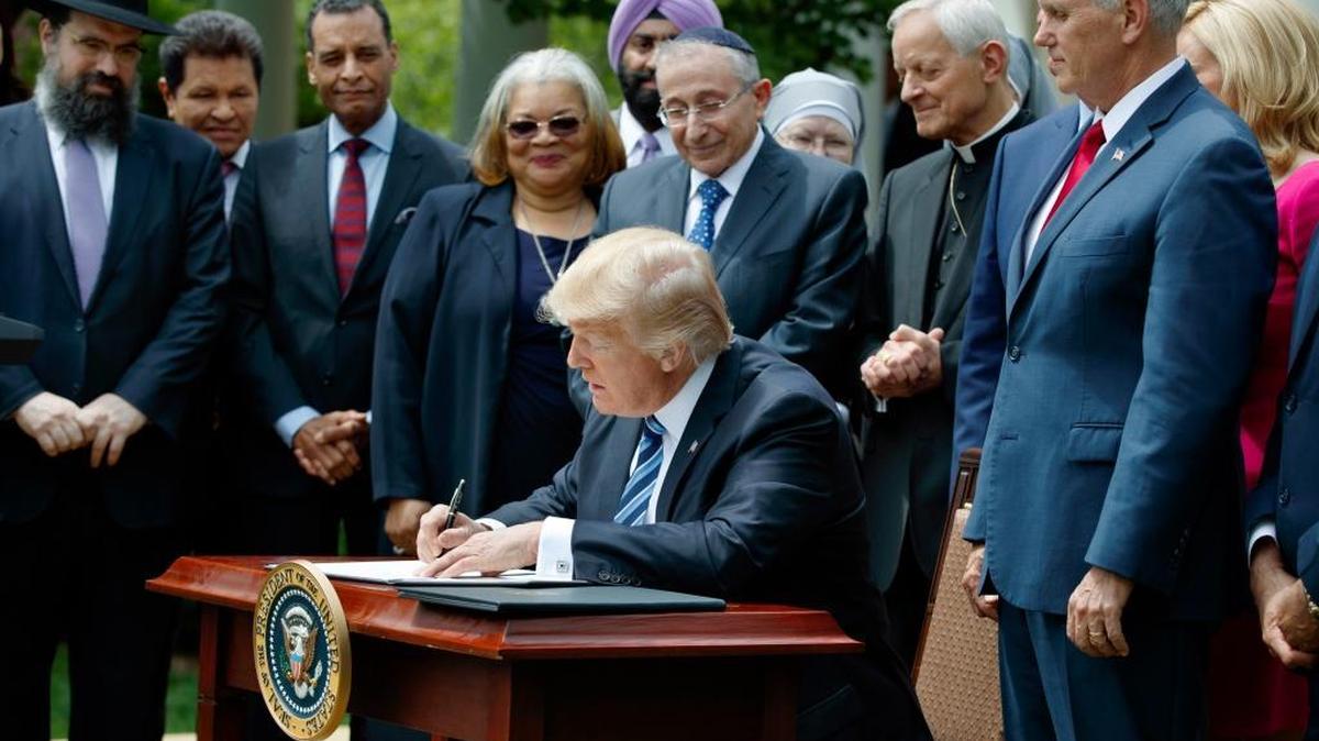 President Donald Trump signed an executive order last week largely aimed at easing an IRS rule limiting political activity for religious organizations. But LGBT rights groups worry it could give protective cover for government employees to discriminate against LGBT people.