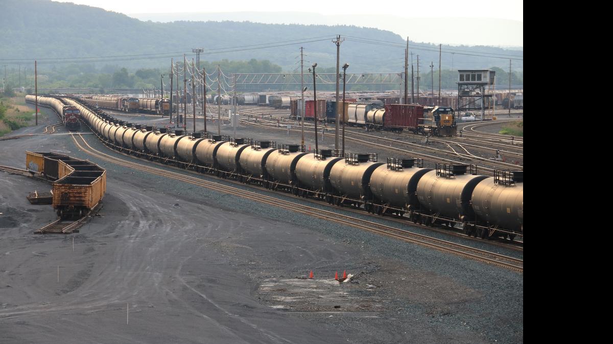 
A CSX oil train moves east through Selkirk Yard near Albany, N.Y., on May 26, 2015. The Albany area has become a hub for crude by rail shipments as East Coast refineries have replaced imported oil with mid-continent sources. CSX and other railroads continue their push to keep routing and volume information about the shipments from the public.
