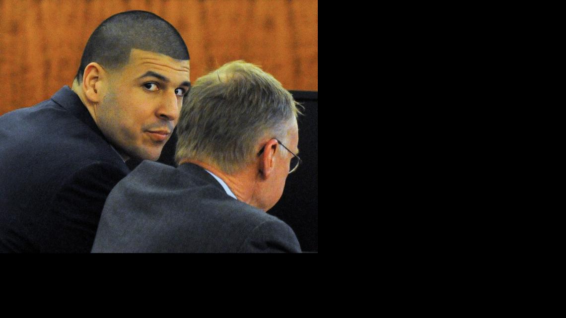 
Former New England Patriots football player Aaron Hernandez, left, sits with his attorney, Charles Rankin, during his trial on Monday, April 13, 2015. in Fall River, Mass. Hernandez is accused of killing Odin Lloyd in June 2013. 
