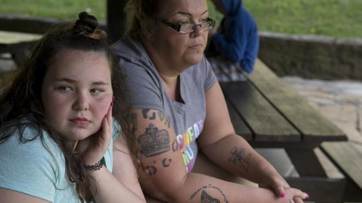 Caitlin Dolan, 13, who was denied lunch at school on her first day of 7th grade over an outstanding balance that her mother, Merinda Durila, right, says was a paperwork mixup, in Canonsburg, Pa., April 18, 2017. Holding children publicly accountable for unpaid school lunch bills – by throwing away their food, providing a less desirable alternative lunch or branding them with markers – is often referred to as “lunch shaming,” and is widespread.
