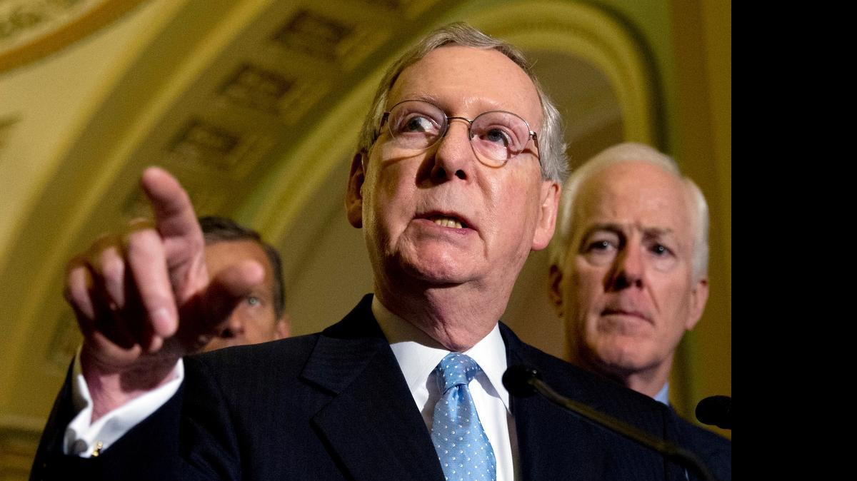 
In this July 8, 2015 file photo, Senate Majority Leader Mitch McConnell of Kentucky speaks to media after a policy luncheon on Capitol Hill in Washington. McConnell and other congressional leaders expressed doubts Sunday, July 12, 2015, about a historic agreement with Iran to address that country's nuclear program, predicting President Barack Obama could face hurdles in Congress if negotiators reach a final deal. 
