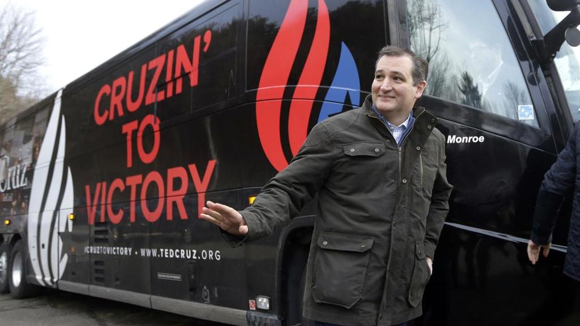 Republican presidential candidate, Sen. Ted Cruz, R-Texas, gets off his bus for a campaign event at Generals Sports Bar and Grill, Feb. 4, 2016, in Weare, N.H.