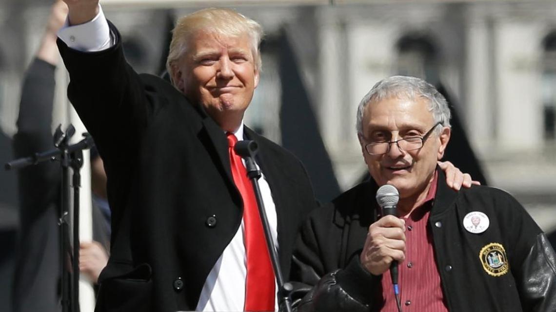 Donald Trump, left, and Carl Paladino, who ran for governor of New York as a Republican in 2010, speak during a gun rights rally at the Empire State Plaza on Tuesday, April 1, 2014, in Albany, N.Y. Paladino served as co-chairman of Trump’s New York campaign.