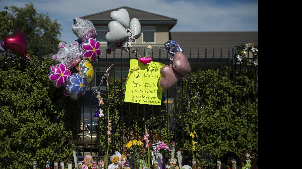
A memorial for Jadianna Larsen rises in front of the housing complex run by Mercy Housing California in Sacramento, Calif., where the 6-year-old had been living. . Her body was found on Thursday in Glenn County, Calif.
