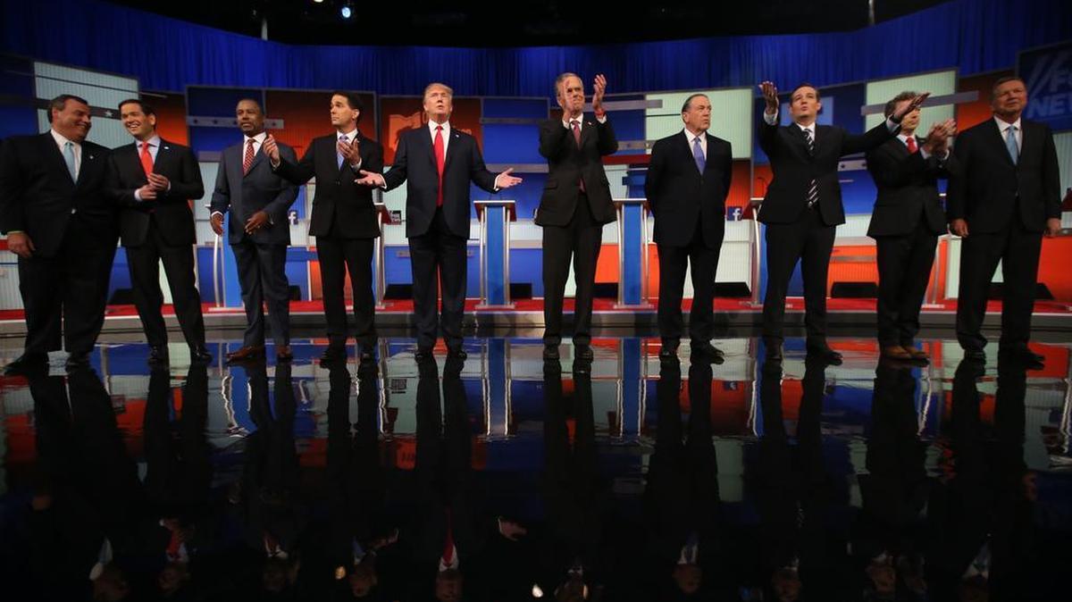 
Republican presidential candidates from left, Chris Christie, Marco Rubio, Ben Carson, Scott Walker, Donald Trump, Jeb Bush, Mike Huckabee, Ted Cruz, Rand Paul, and John Kasich take the stage for the first Republican presidential debate at the Quicken Loans Arena Thursday, Aug. 6, 2015, in Cleveland.
