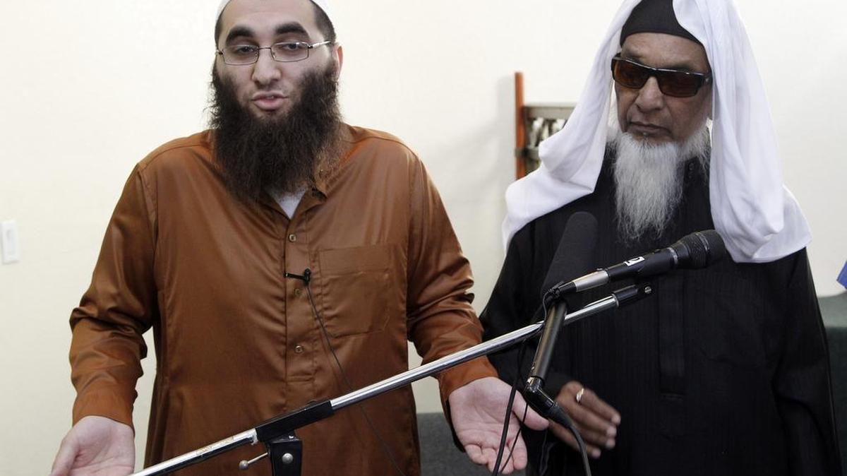 Roshan Abassi, left, a teacher at the Dar Al Uloom Al Islamiyah mosque in San Bernardino, and Mohammad Nadvi, the mosque’s founder, answer questions after prayer at the mosque in San Bernardino, Calif., on Friday, Dec. 4, 2015. Syed Rizwan Farook was known to pray every day at the mosque. Authorities say he and his wife, Tashfeen Malik, killed his co-workers Wednesday at a holiday party at a social service facility in the city.