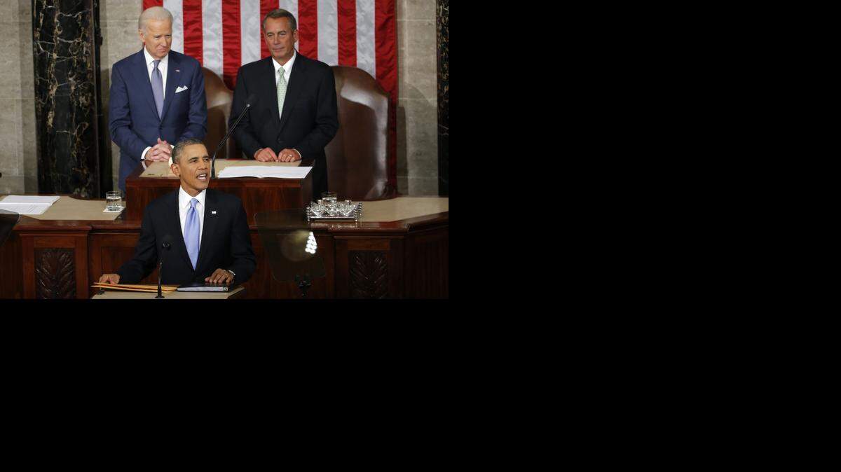 
In this Jan. 28, 2014 file photo, President Barack Obama takes the podium to give his State of the Union address on Capitol Hill in Washington. Vice President Joe Biden and House Speaker John Boehner of Ohio are behind the president. They call it the State of the Union address. But presidents spend more time laying out their to-do lists and beseeching Congress, mostly unsuccessfully, to approve a wish list of legislative proposals. The actual condition of the country gets short shrift. 
