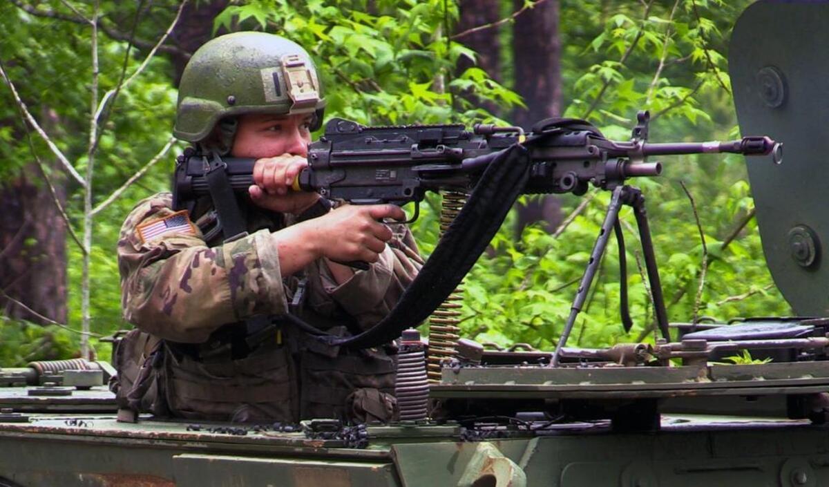 A female soldier in Alpha Company, 1st Battalion, 19th Infantry Regiment fires an M249 Squad Automatic Weapon during a field training exercise of One Station Unit Training at Fort Benning, Georgia.The third and final phase of U.S. Army gender integration reached a significant milestone Friday when 18 women graduated from active duty basic training at Fort Benning, becoming infantrymen.