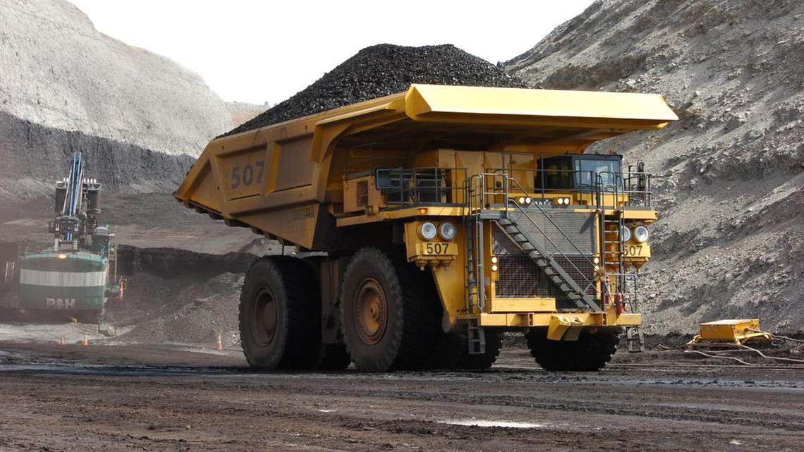 A mining dump truck hauls coal at Cloud Peak Energy’s Spring Creek strip mine near Decker, Mont., in April 2013. Coal companies oppose an Obama administration effort to protect streams from the impacts of coal mining operations.
