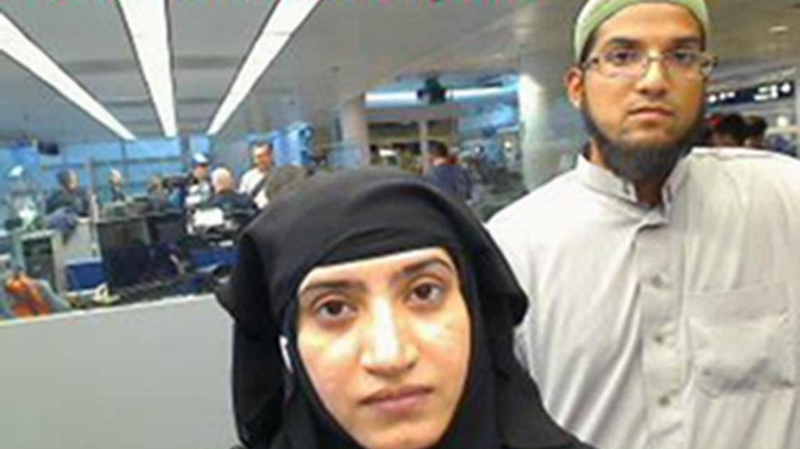 This July 27, 2014, photo provided by U.S. Customs and Border Protection shows Tashfeen Malik, left, and Syed Farook, as they passed through O'Hare International Airport in Chicago. The husband and wife died on Dec. 2, 2015, in a gun battle with authorities several hours after their assault on a gathering of Farook's colleagues in San Bernardino, Calif.