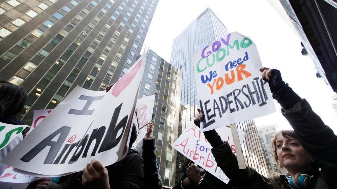 Protesters gather outside of New York Gov. Andrew Cuomo's office on Wednesday, Oct. 26, 2016, in New York. Hundreds of Airbnb hosts gathered outside Cuomo's office to rally for “fair” home-sharing laws.