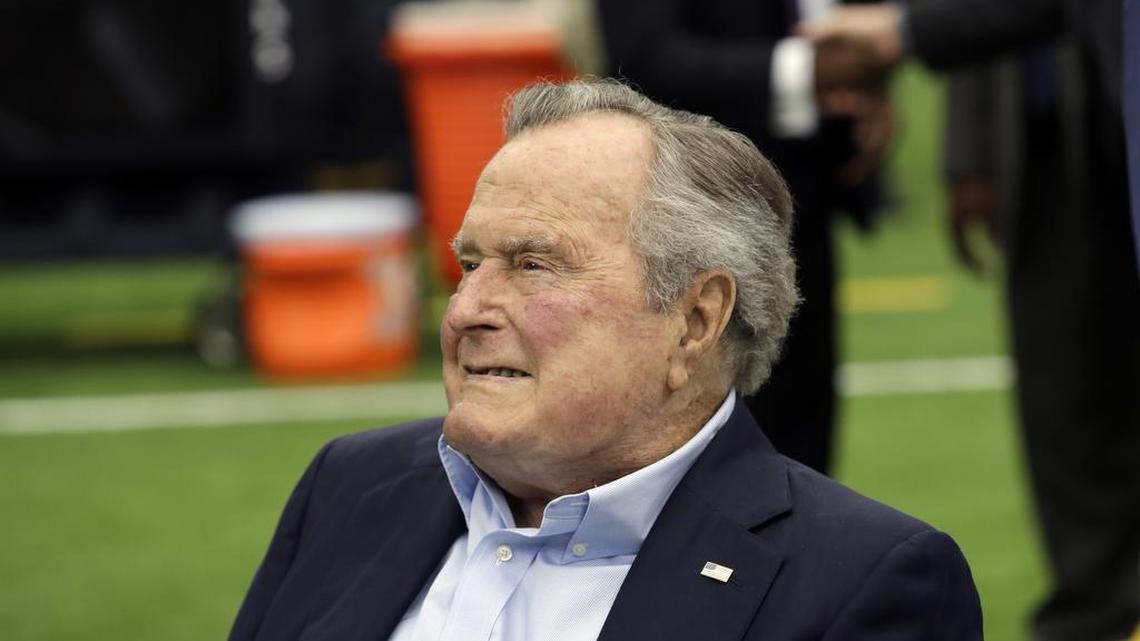 Former president George H.W. Bush arrives for an NFL football game between the Houston Texans and the Indianapolis Colts, Sunday, Nov. 5, 2017, in Houston.