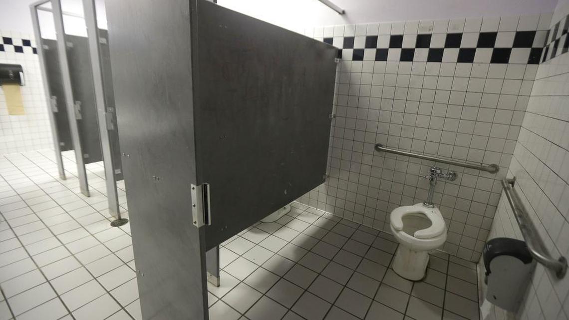 A 25-year-old Georgia man faces a series of charges in connection with accusations he was taking photos of other men in restroom stalls at a Walmart, Griffin police officials say.