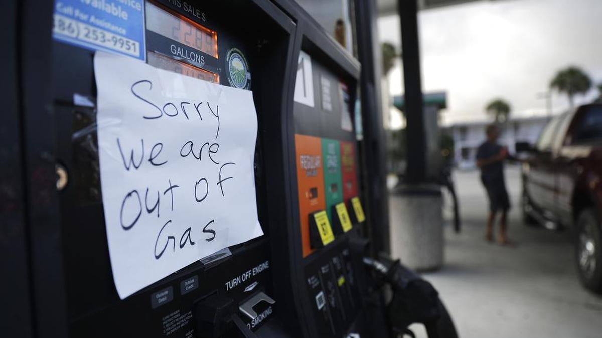 A note is posted to a gas pump after the station ran out of gas ahead of Hurricane Irma in Daytona Beach, Fla., Friday, Sept. 8, 2017.