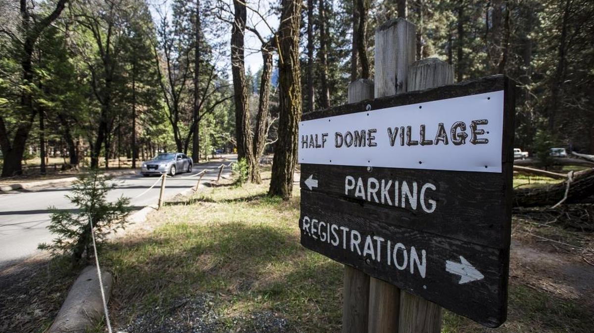 A sign directing Yosemite National Park visitors to Half Dome Village, which was known as Curry Village under the previous concessionaire. The name is one of the disputed trademarks now the subject of a lawsuit.
