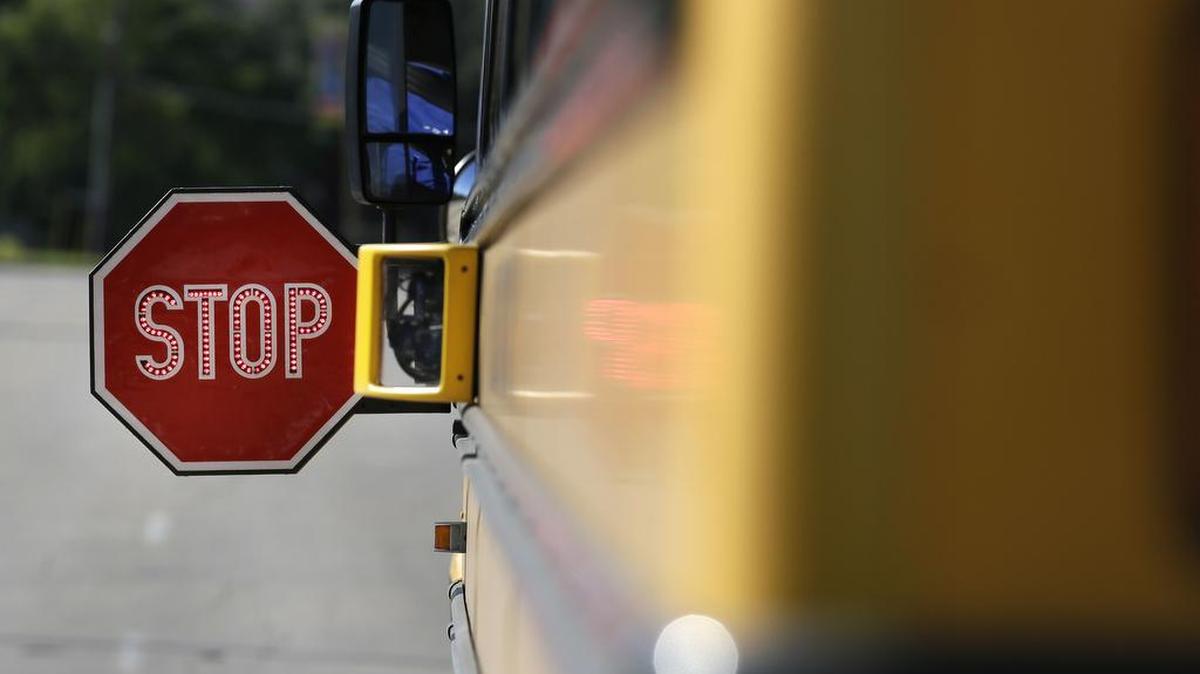 A Michigan school district warned parents that someone in an unmarked school bus had reportedly been trying to pick up children on their way to school, but it turned out to be a case of mistaken identity.