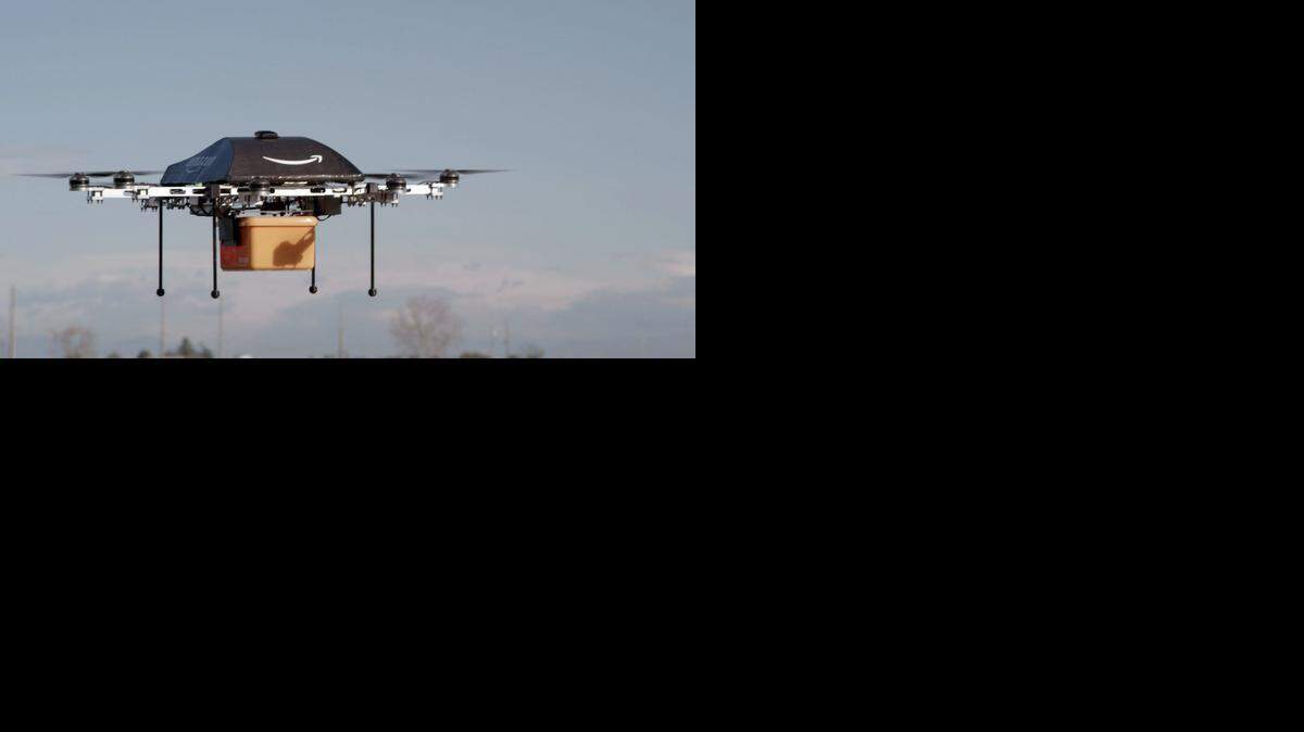 
This undated image provided by Amazon.com shows the so-called Prime Air unmanned aircraft project that Amazon is working on in its research and development labs. 
