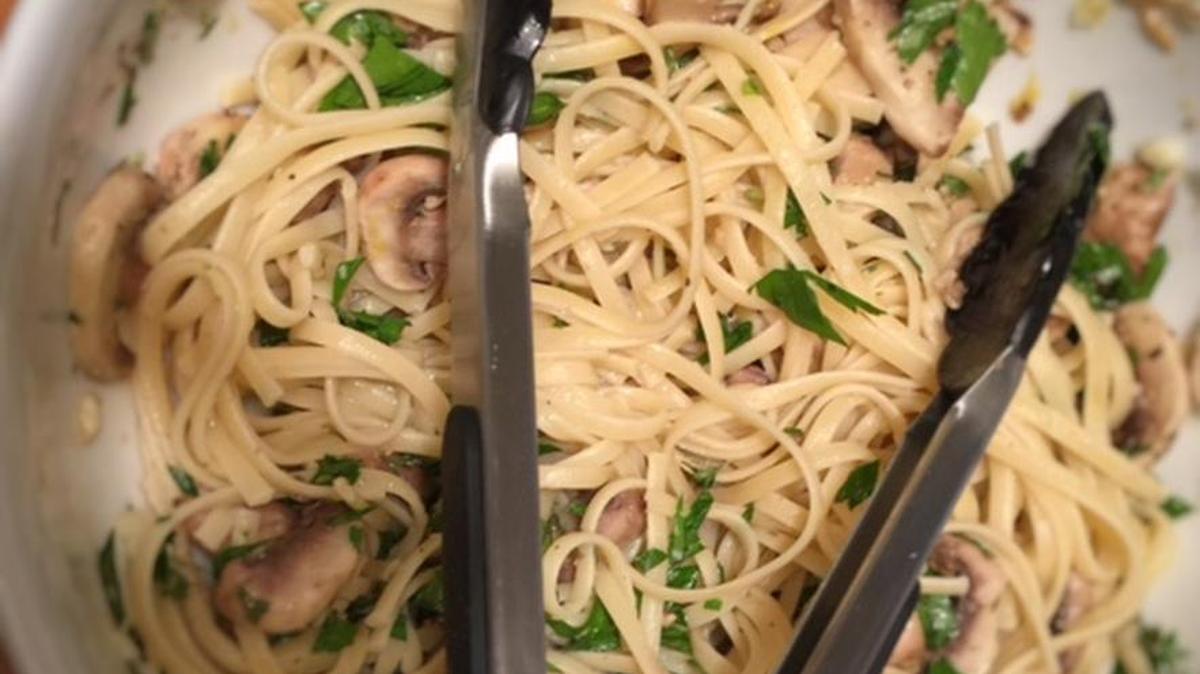 Soaking mushrooms in olive oil, salt and lemon juice “cooks” them while the pasta boils.