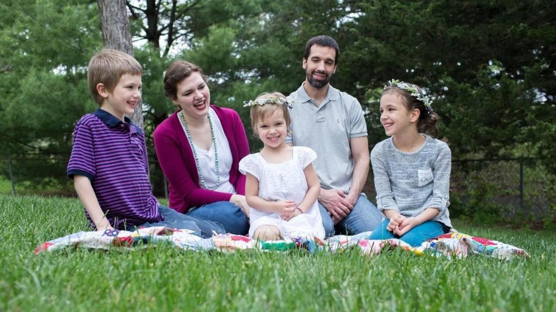 Overland Park mom Rachel Hillestad, second from left - pictured here with her husband, Scott, and their children Asher, Phoebe and Lucy - has written a Facebook essay about foster parenting that has gone viral.