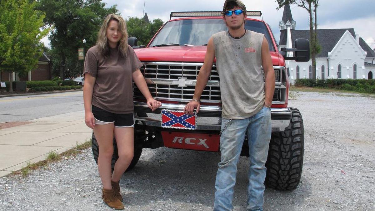 
Carson Kimsey, 23, and wife Nikki Kimsey traveled over 30 miles from Elbert County, Ga., to Abbeville, S.C., where they hoped to buy a Confederate flag, only to learn that the store had sold out. 
