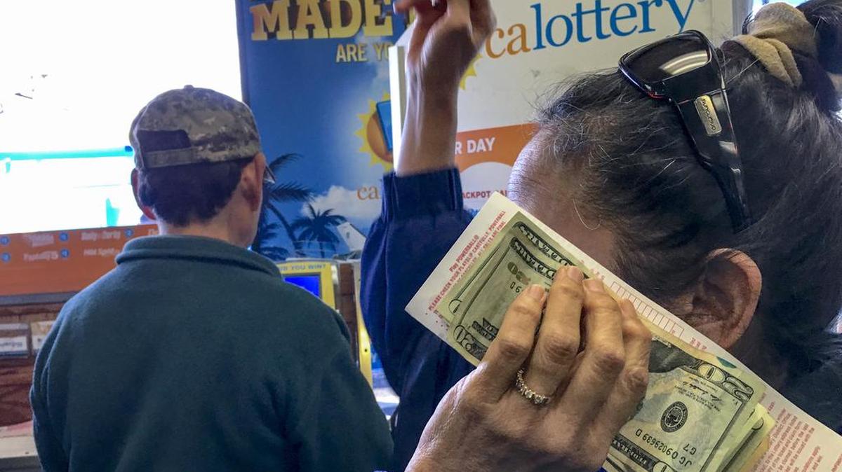 Customers wait to buy lottery tickets Jan. 13 at the Blue Bird liquor store in Hawthorne, Calif. With hours to go and $63 million on the line, the mystery remains: Where’s the winning California Lottery ticket – the one sold last Aug. 8, that is – and why hasn’t somebody cashed it? Whatever the reason, it won’t be a good enough excuse if the 5 p.m. Thursday deadline passes and nobody produces the ticket at a lottery office. The ticket was sold at a 7-Eleven store in the Chatsworth neighborhood of Los Angeles.