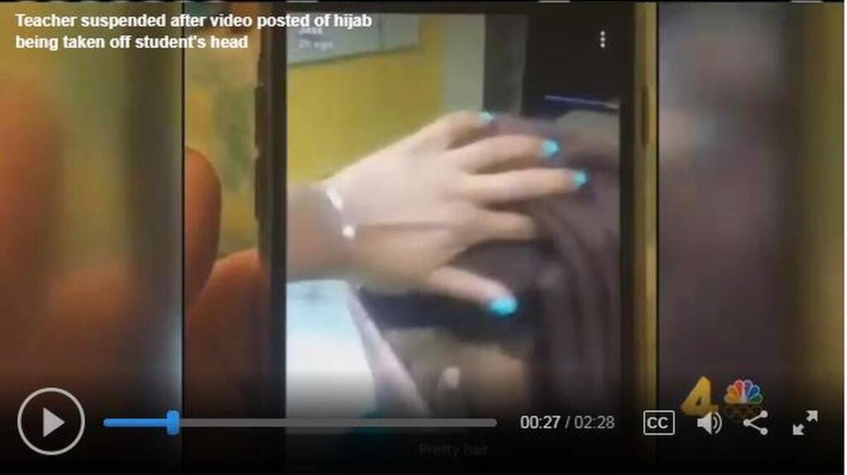 A screenshot of a Snapchat shows a student’s hijab being ripped off her head.