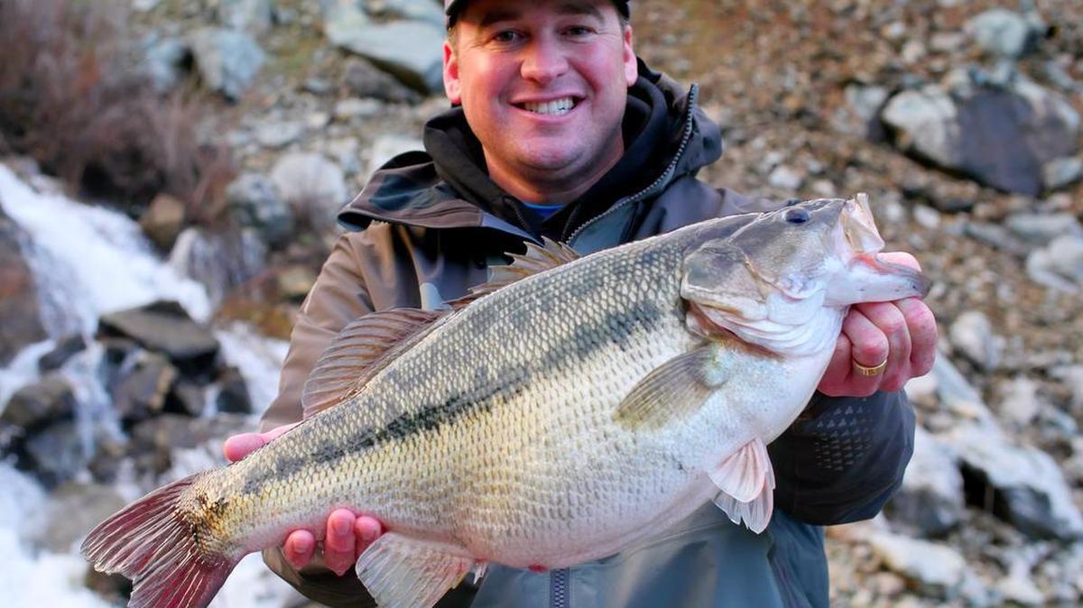 Cody Meyer holds his potential world record spotted bass he caught Friday at New Bullards Bar reservoir in Yuba County, Calif. The fish weighed in at 10.80 pounds.