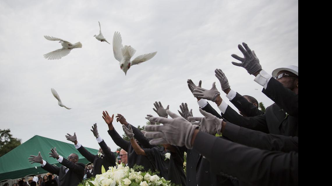 
Pallbearers release doves over the casket of Ethel Lance during her burial service, Thursday in Charleston, S.C. Lance was one of the nine people killed in the shooting at Emanuel AME Church in Charleston last week.
