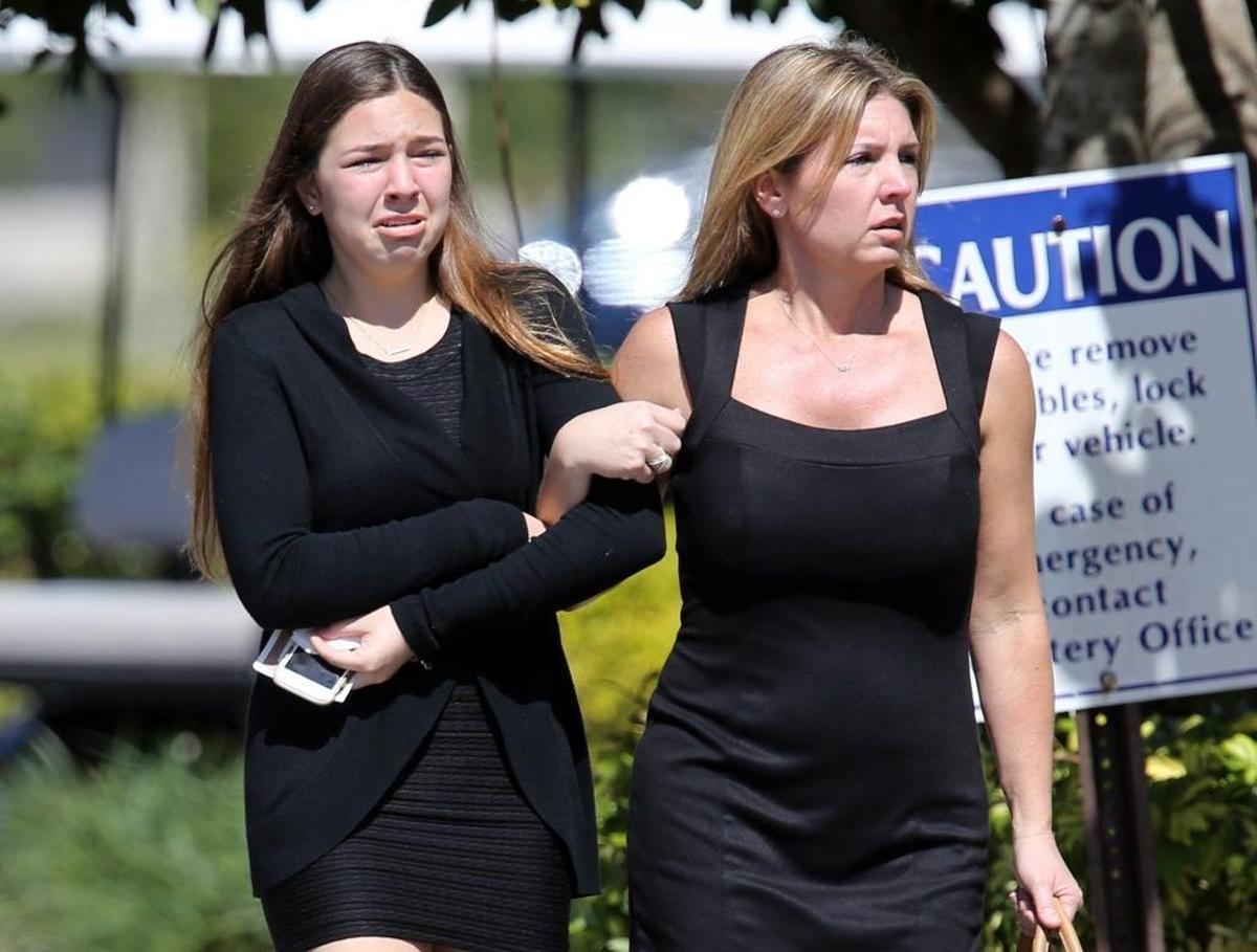 Mourners leave the Star of David Memorial Gardens Cemetery and Funeral Chapel in North Lauderdale after the funeral of Alyssa Alhadeff, Feb. 16, 2018. Alhadeff was one of the 17 victims killed in the mass shooting at Marjory Stone Douglas High School on Wednesday.