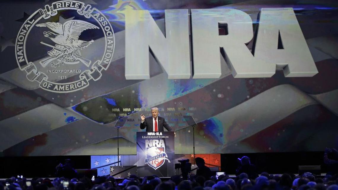 Republican presidential candidate Donald Trump speaks at the National Rifle Association convention on Friday.