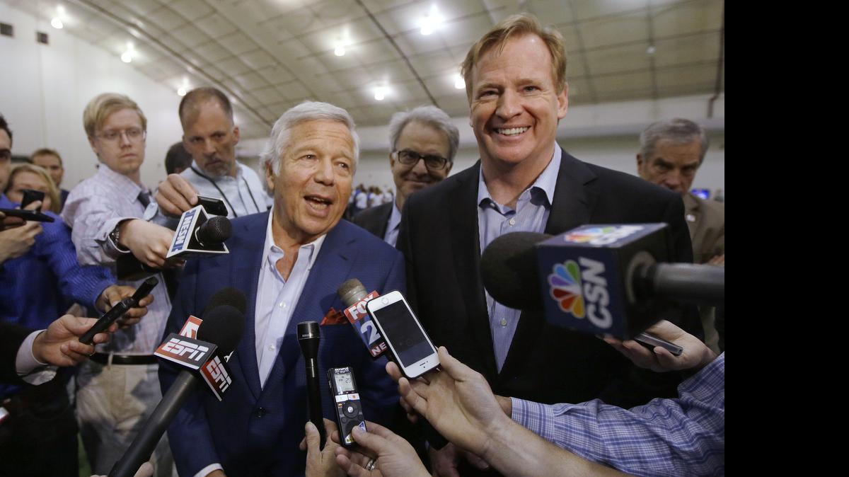 
In this May 29, 2014, photo, NFL Commissioner Roger Goodell, right, and New England Patriots owner Robert Kraft address members of the media during a football safety clinic for mothers at the team's facilities in Foxborough, Mass. Kraft and Goodell have worked closely, but that alliance was strained with the league’s punishment of quarterback Tom Brady and his team in the “Deflategate” scandal. 
