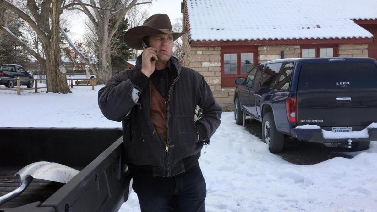 Ryan Bundy talks on the phone at the Malheur National Wildlife Refuge near Burns, Ore., on Sunday. Bundy is one of the protesters occupying the refuge to object to a prison sentence for local ranchers for burning federal land.