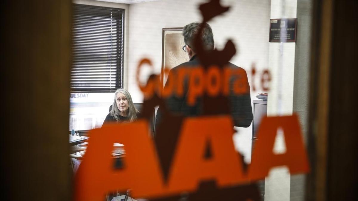 McClatchy Washington Bureau reporter Kevin G. Hall, right, talks with registered agent Linda Grayson in the office suite of AAA Corporate Services in the Deming Building in downtown Cheyenne, Wyo., on March 8, 2016. Wyoming is the least populous and the second least densely populated of the 50 United States but a very popular location for the formation of offshore corporations, because with the help of a registered agent one can set up a LLC in Wyoming without one's name having to be in the State Register.