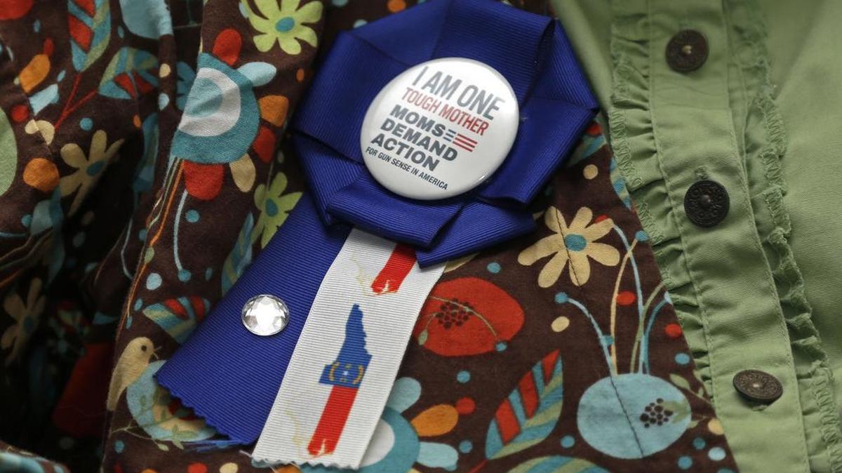 N.C. gun-control activist Kim Yaman wears a Moms Demand Action button.