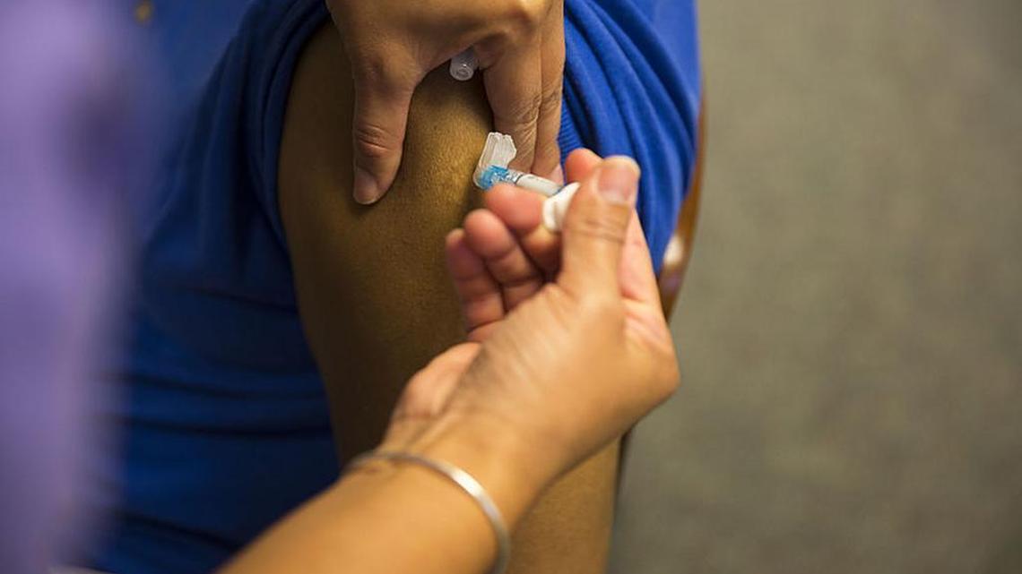 The flu shot is no cure for “man flu.” Or is it?