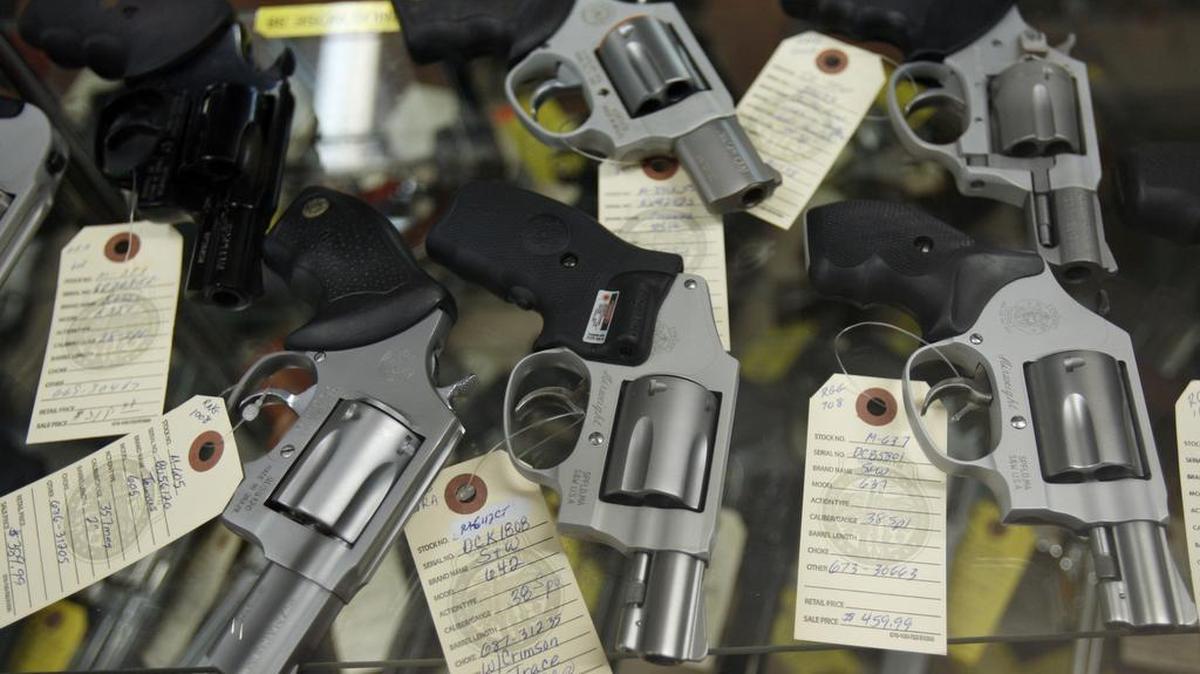 An array of handguns are in a case at the Bob Moates sport shop in Richmond, Va., Thursday, Nov. 6, 2008.