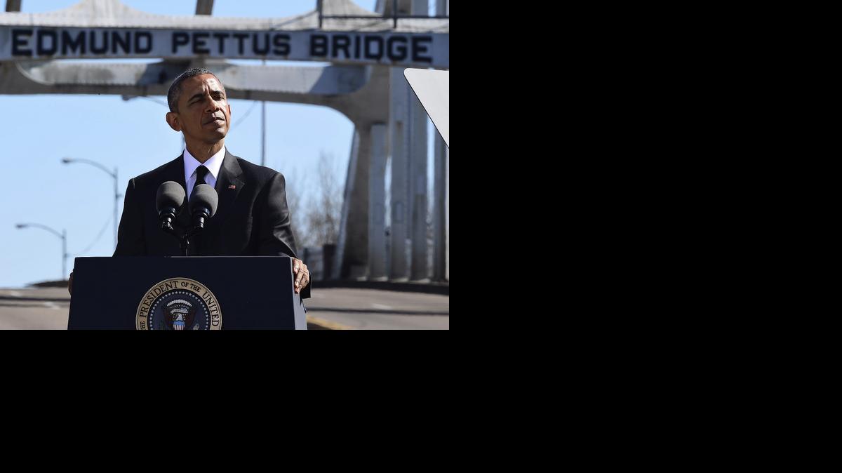
President Barack Obama speaks near the Edmund Pettus Bridge, Saturday, March 7, 2015, in Selma, Ala. 
