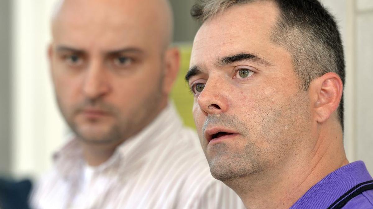 
James Yates, right, speaks with reporters as his partner William Smith Jr. looks on at the Rowan County Courthouse in Morehead, Ky., Thursday, Aug. 27, 2015. The couple were denied a marriage license for a third time despite the ruling of the 6th U.S. Circuit Court of Appeals upholding an earlier decision instructing the clerks to issue mariage licenses.
