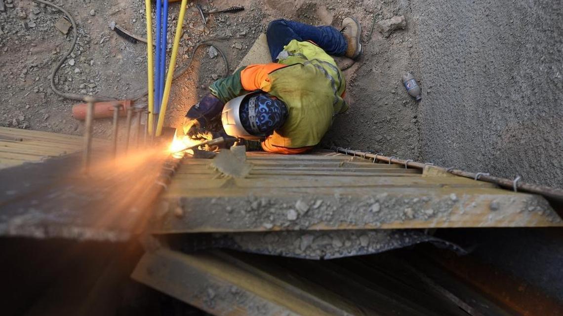 Construction continues on a pedestrian tunnel and expanding dropoff and arrival roadways to 16 lanes at Charlotte Douglas International Airport in Charlotte, N.C., on July 29, 2016. The roadway is part of Destination CLT, a 10-year, multi-project Development Plan.