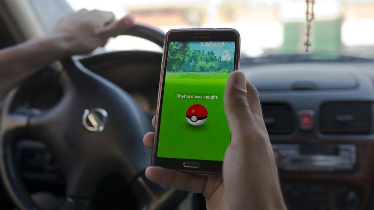 A 60-year-old grandfather was shot and killed while playing the popular smartphone game Pokemon Go in his parked car Thursday.