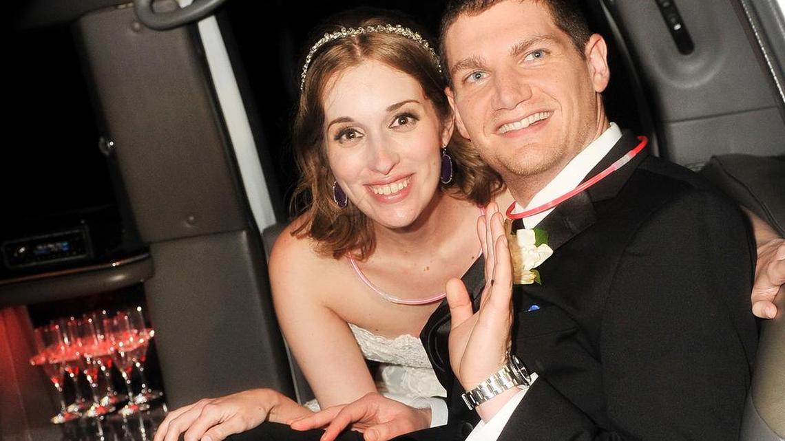 Neely and Andrew Moldovan, shown on their wedding day, may have to pay their photographer $1 million after a dispute made international news.