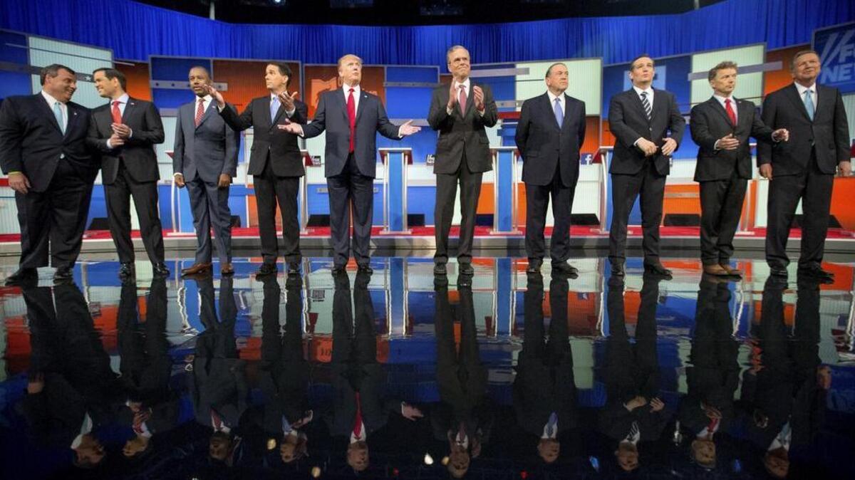 
Republican presidential candidates Chris Christie, Marco Rubio, Ben Carson, Scott Walker, Donald Trump, Jeb Bush, Mike Huckabee, Ted Cruz, Rand Paul, and John Kasich, left to right, take the stage for the first Republican presidential debate Aug. 6, 2015, in Cleveland, Ohio. The second debate on Wednesday, Sept. 15, 2015, will add Carly Fiorina to the lineup.
