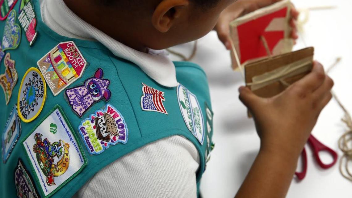 A member of the Girl Scouts of Central Maryland is pictured July 21, 2017, as the Girl Scouts unveiled a major push into furthering the interest of girls in science, engineering, technology and math through 23 new badges, its largest addition of new badges in a decade.