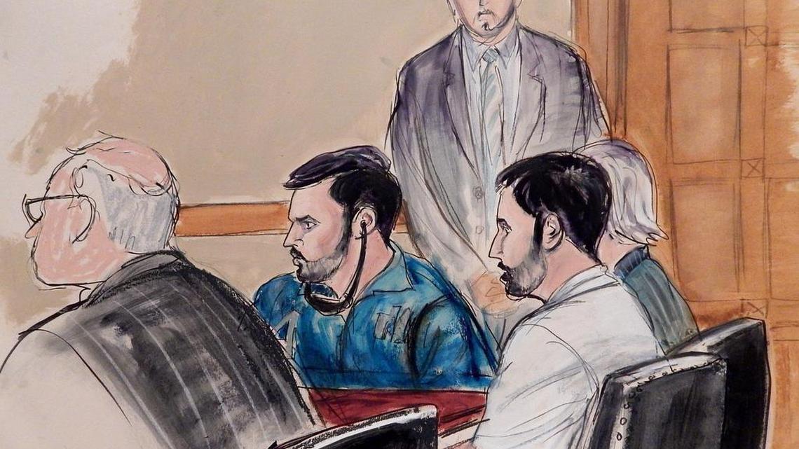 In this courtroom sketch, a U.S. marshall stands guard as Francisco Flores, center in blue shirt, and Efrain Campos, second from right, make an initial appearance in Manhattan federal court on Thursday, Nov. 12, 2015, in New York. Campos and Flores, nephews of Venezuela's first lady, are accused of conspiring to smuggle cocaine into the United States. (AP Photo/Elizabeth Williams)